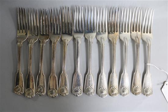 A harlequin set of twelve William IV silver fiddle, thread and shell table forks, 38 oz.